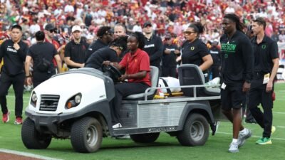 Oregon QB Moore taken off by ambulance after targeting by USC