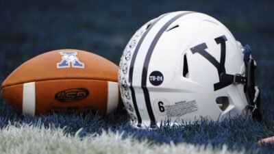 Reno throws for 4 TDs, leads Yale to win after death of father